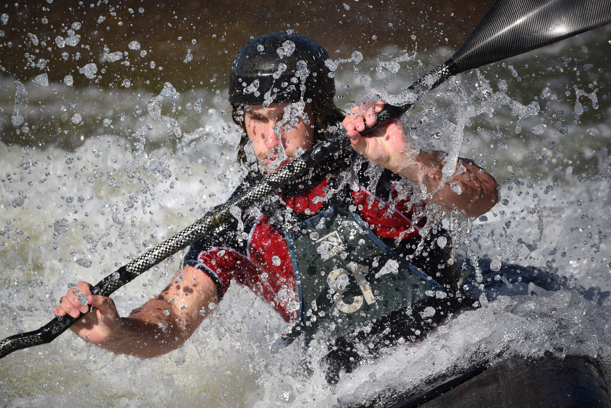 AF-P NIKKOR 70-300mm f/4.5-5.6E ED VR photo of a kayaker in white water