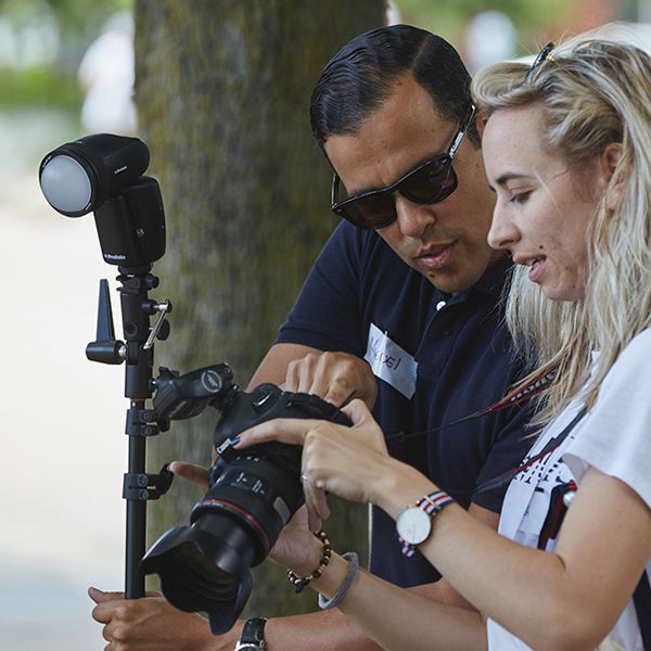 Image of two people looking at camera