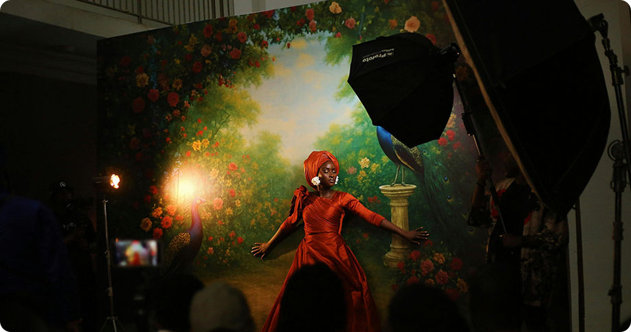 Man taking photo with Canon camera